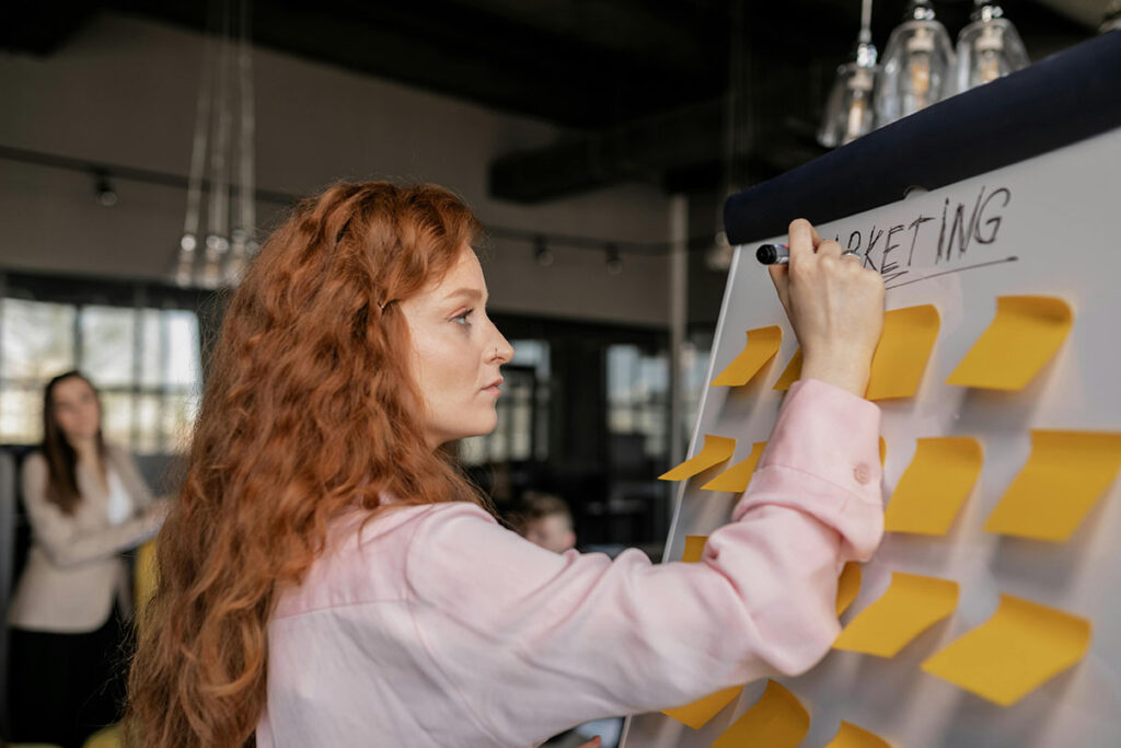 Woman brainstorming a marketing plan